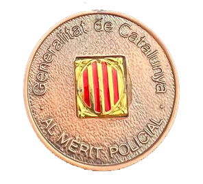 Medalla con distintivo azul de la Generalitat de Catalunya.